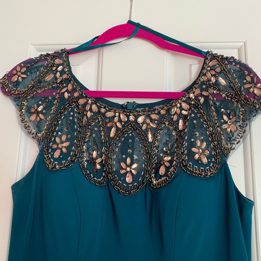 Beautiful XSCAPE gown.  Wore to a wedding .  Only worn once.  No alterations.